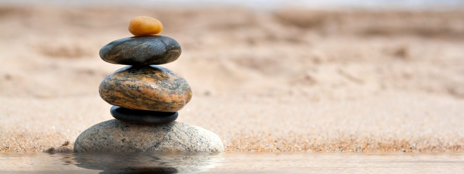 Stacked Zen Rocks Reflection